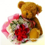 bear-rose-040709 bear with rose bouquet