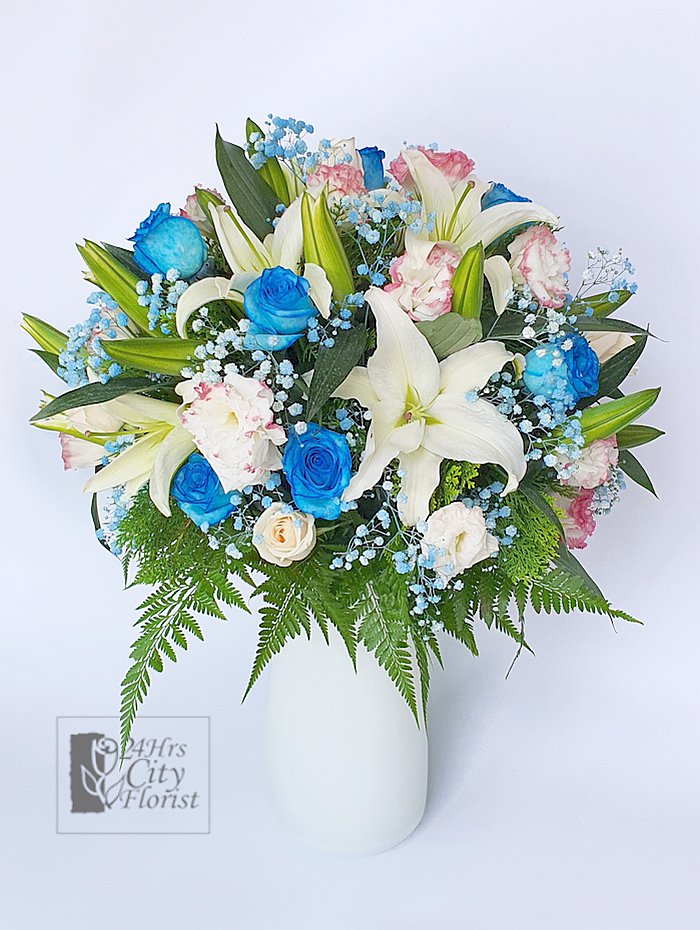 blue rose tall flower arrangement