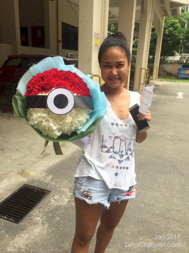 Isabel with her pokeball bouquet