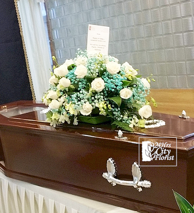 Half-couch casket spray