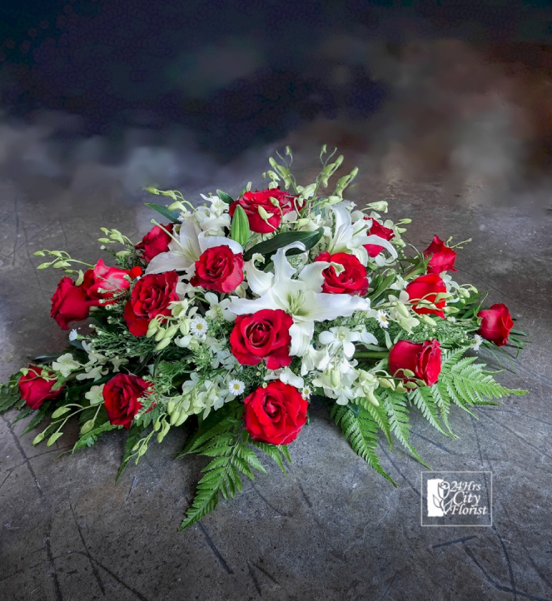 What is a casket spray?