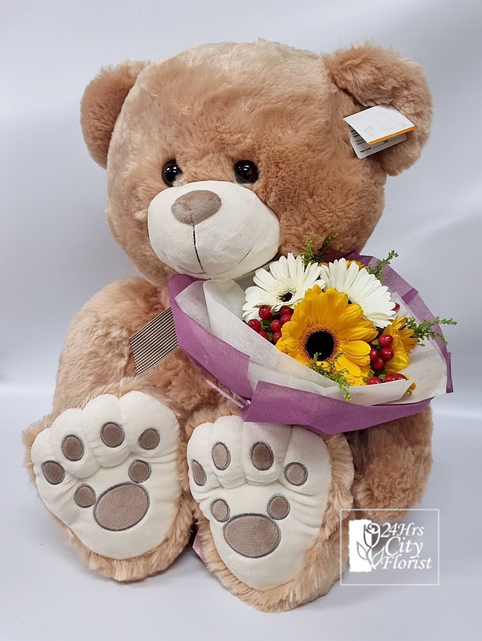 big bear with flowers