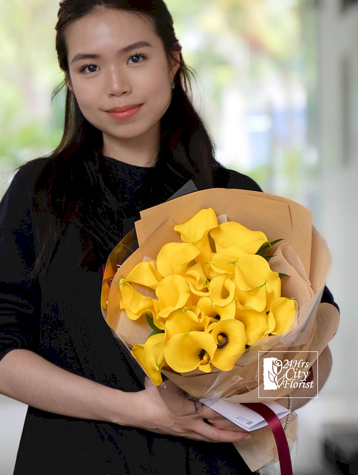 Appealingly Elegant -yellow calla lilies bouquet.