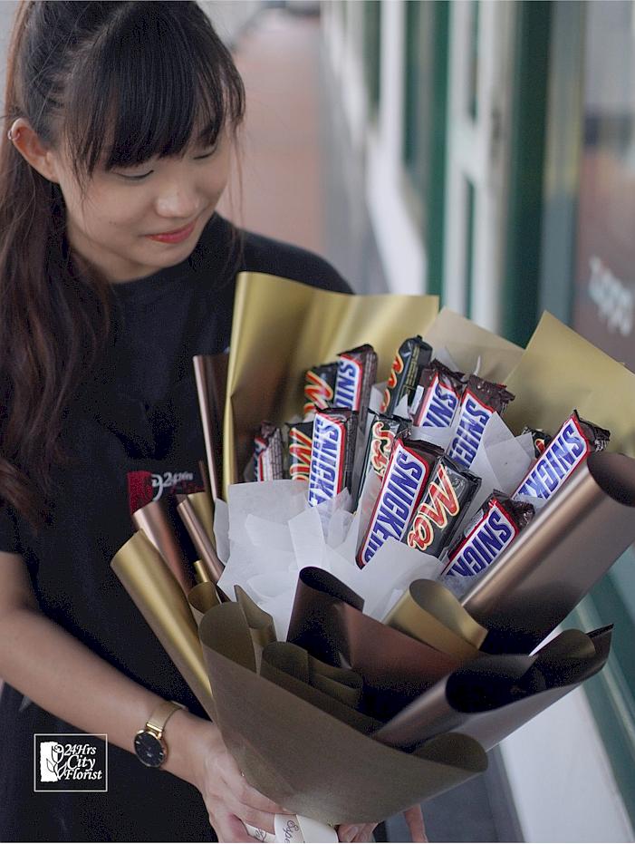 chocolate bouquet - chocolate bars arranged in a hand bouquet 