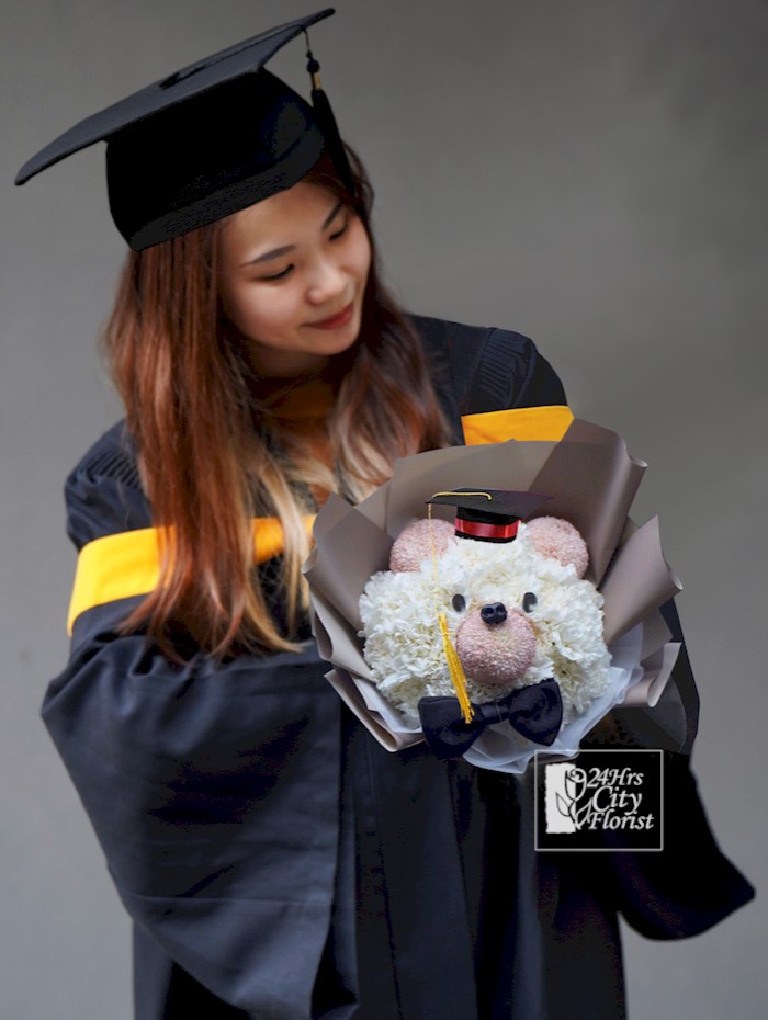 Beary Smart - bouquet of flowers arranged into a bear