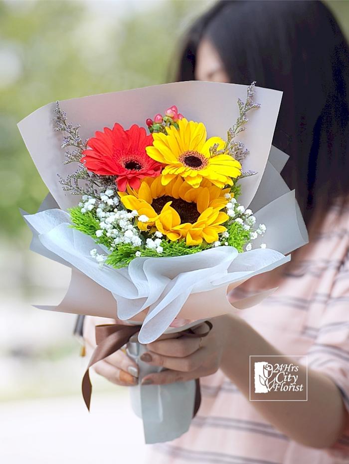 Happy: A single sunflower bouquet - 24Hrs City Florist 