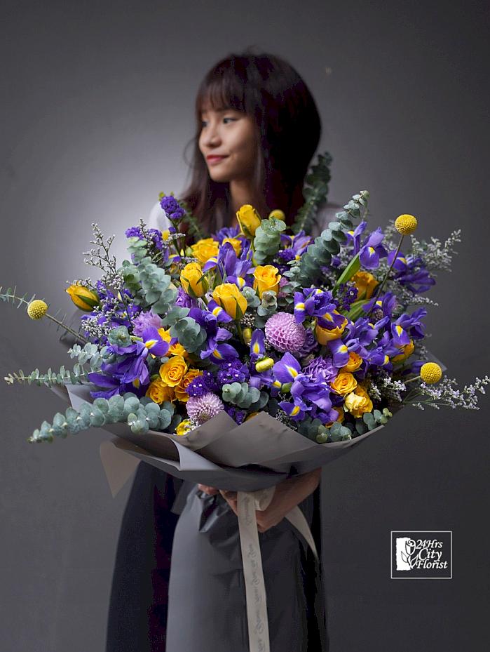 iris, dahlia and ranunculus flowers bouquet