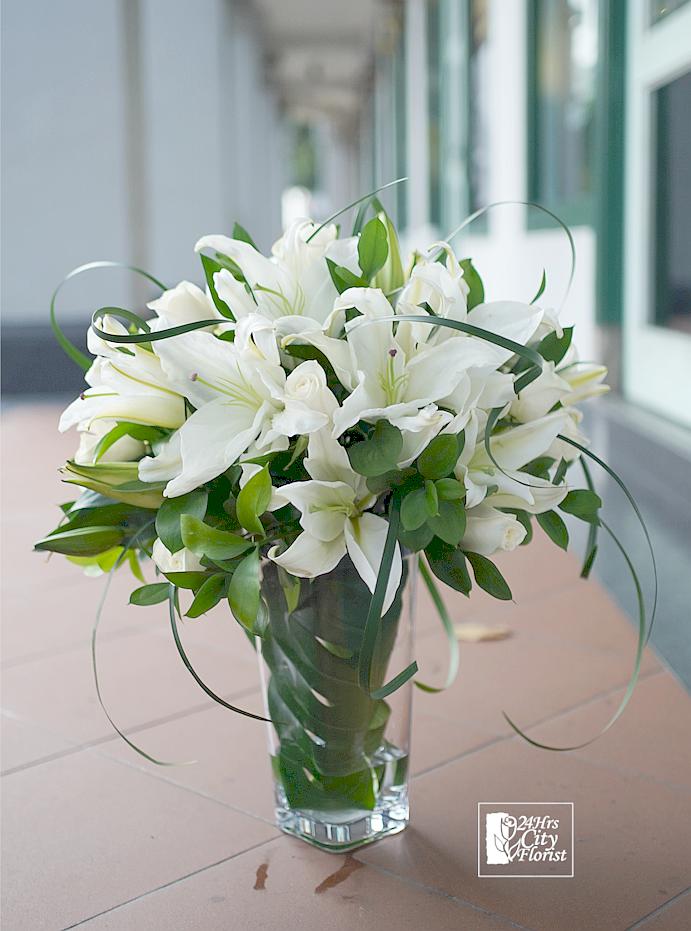 Oriental White Lilies in Vase