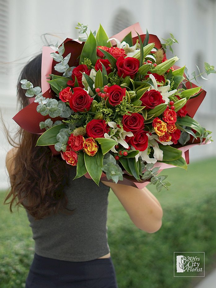 lily and red rose bouquet