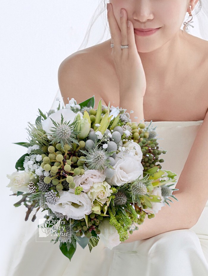 Bridal Bouquet - consisting of white eustoma with an assortment of Australian wild flowers.