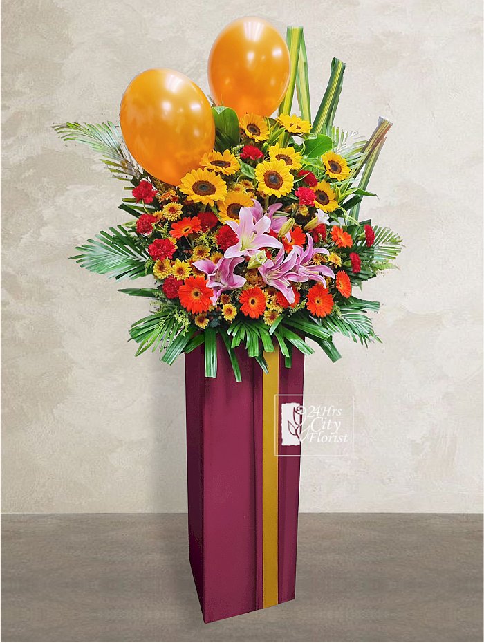 admiration - grand opening flower stand with pink lilies, sunflowers, gerberas and balloons